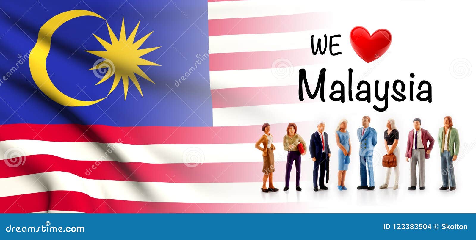 We Love Malaysia, a Group of People Pose Next To the Malaysian Flag