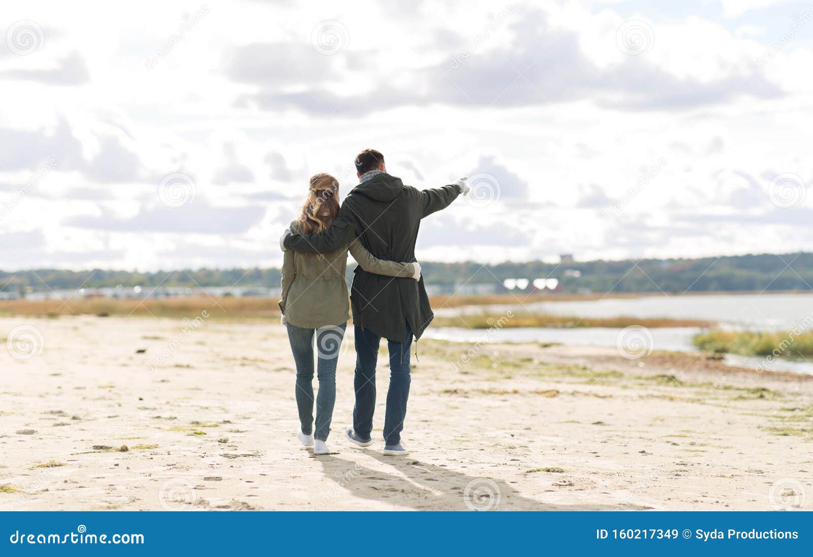 Couple Walking Along Autumn Beach and Hugging Stock Image - Image of ...