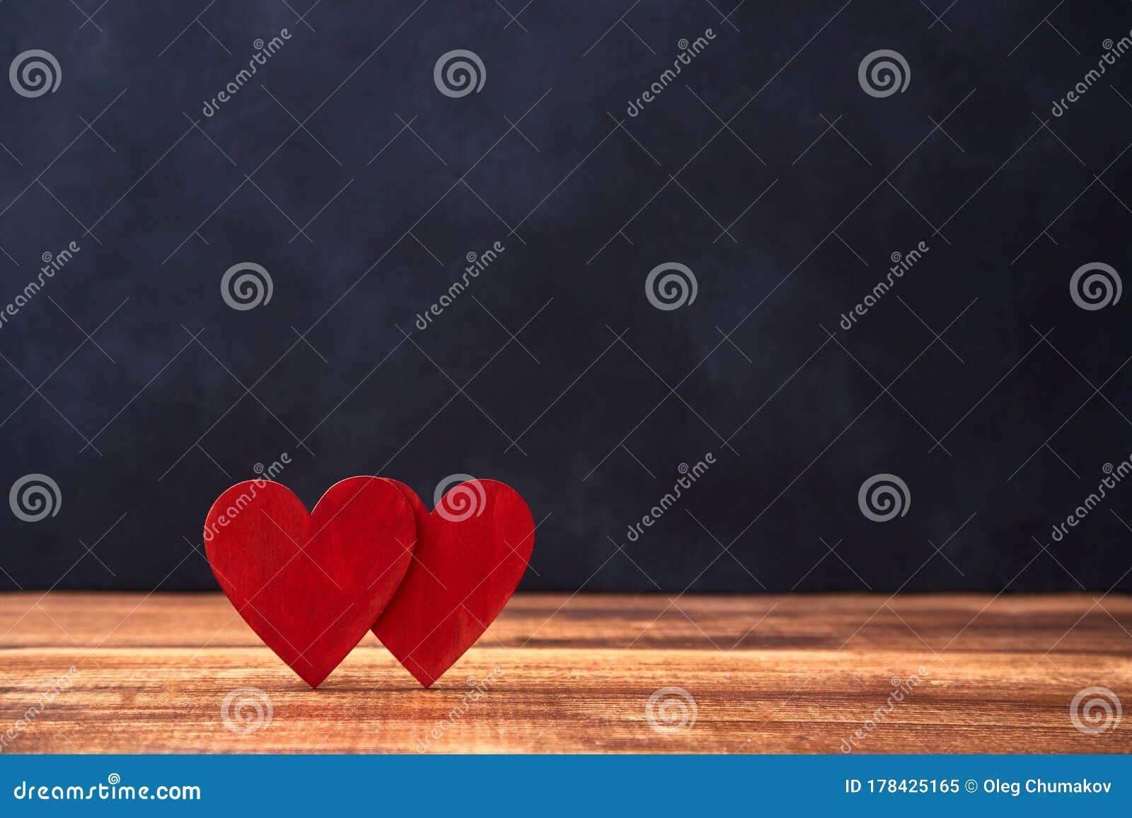 love and relationship. saint valentines day mockup. couple in love. amour, fondness. two red hearts on dark backdrop
