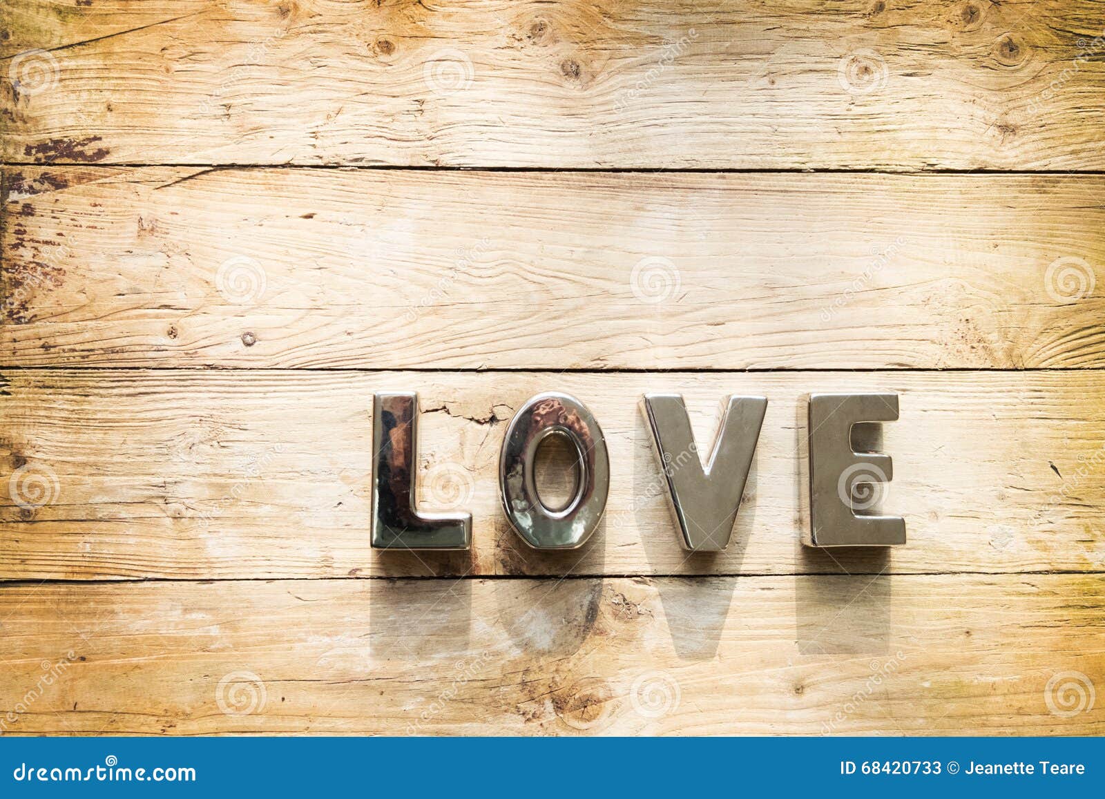 Love Spelled Out on Wooden Background Stock Image - Image of shadow ...