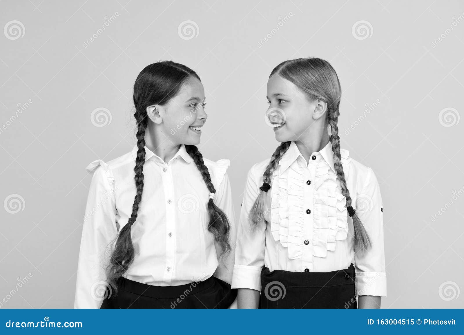 We Love Study. Happy Children in Uniform. Little Girls on Yellow ...