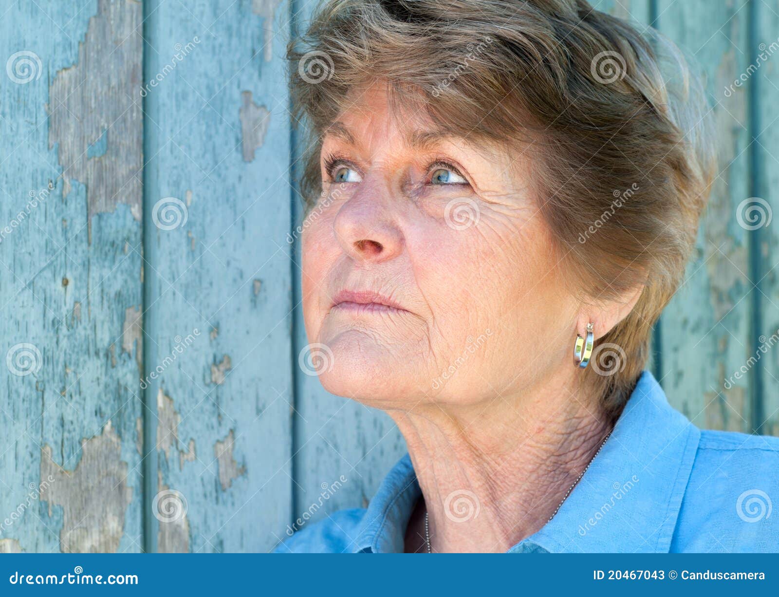 Lovely 70 Year Old Woman Looking Up In Thought Stock Image Image of