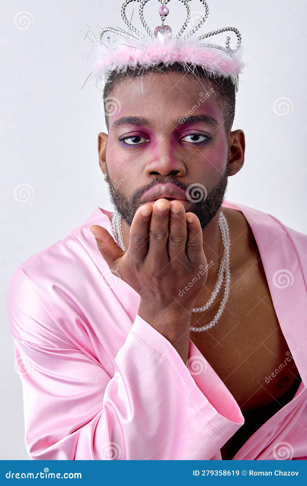 Lovely Black American Guy in Pink Shirt and Crown Flowing a Kiss at ...