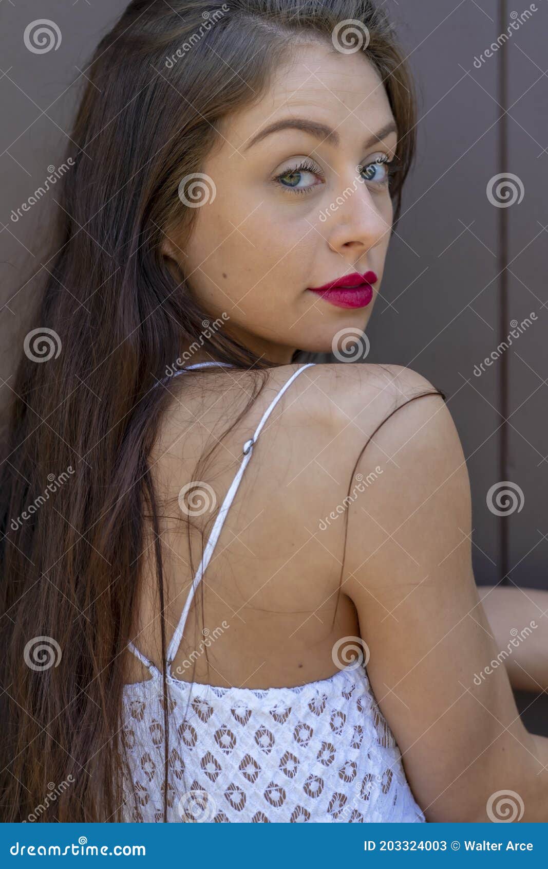 A Lovely Brunette Model Enjoys An Spring Day Outdoors Stock Image