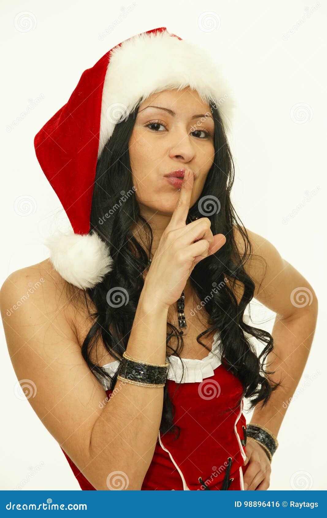 Happy Christmas Girl in Santa Hat Doing a Hush Sign Stock Photo - Image ...