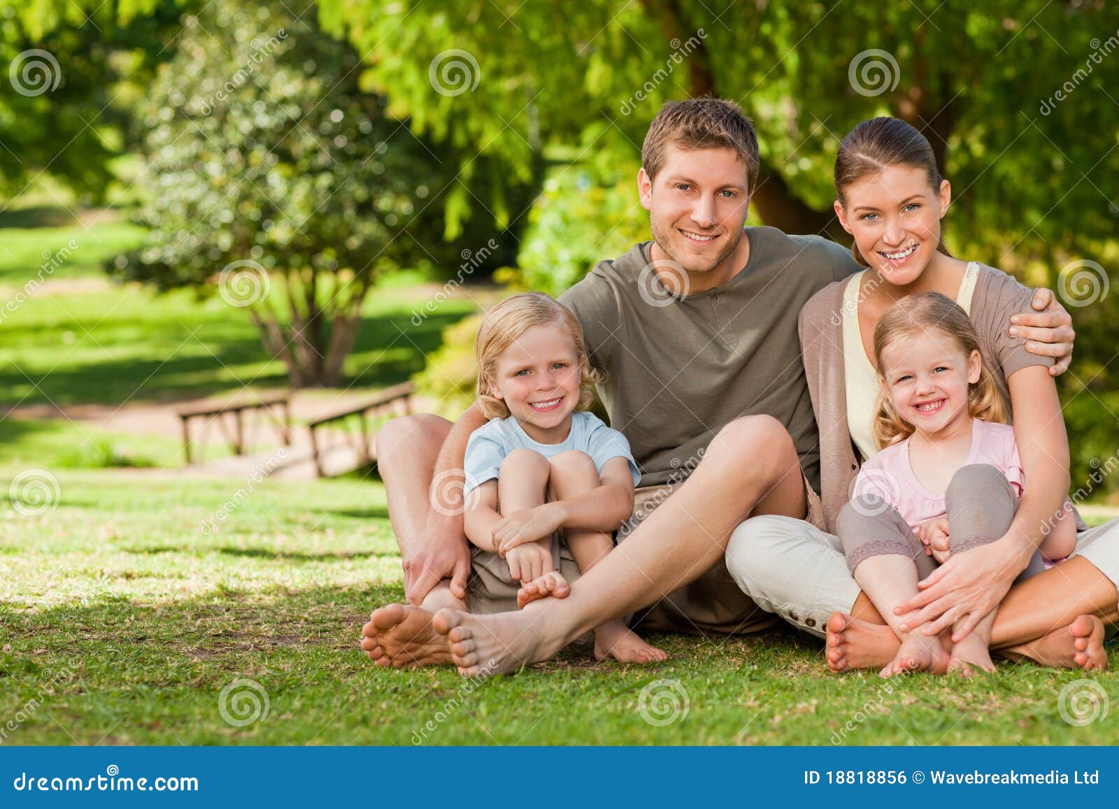 Lovely family in the park stock photo. Image of love 18818856