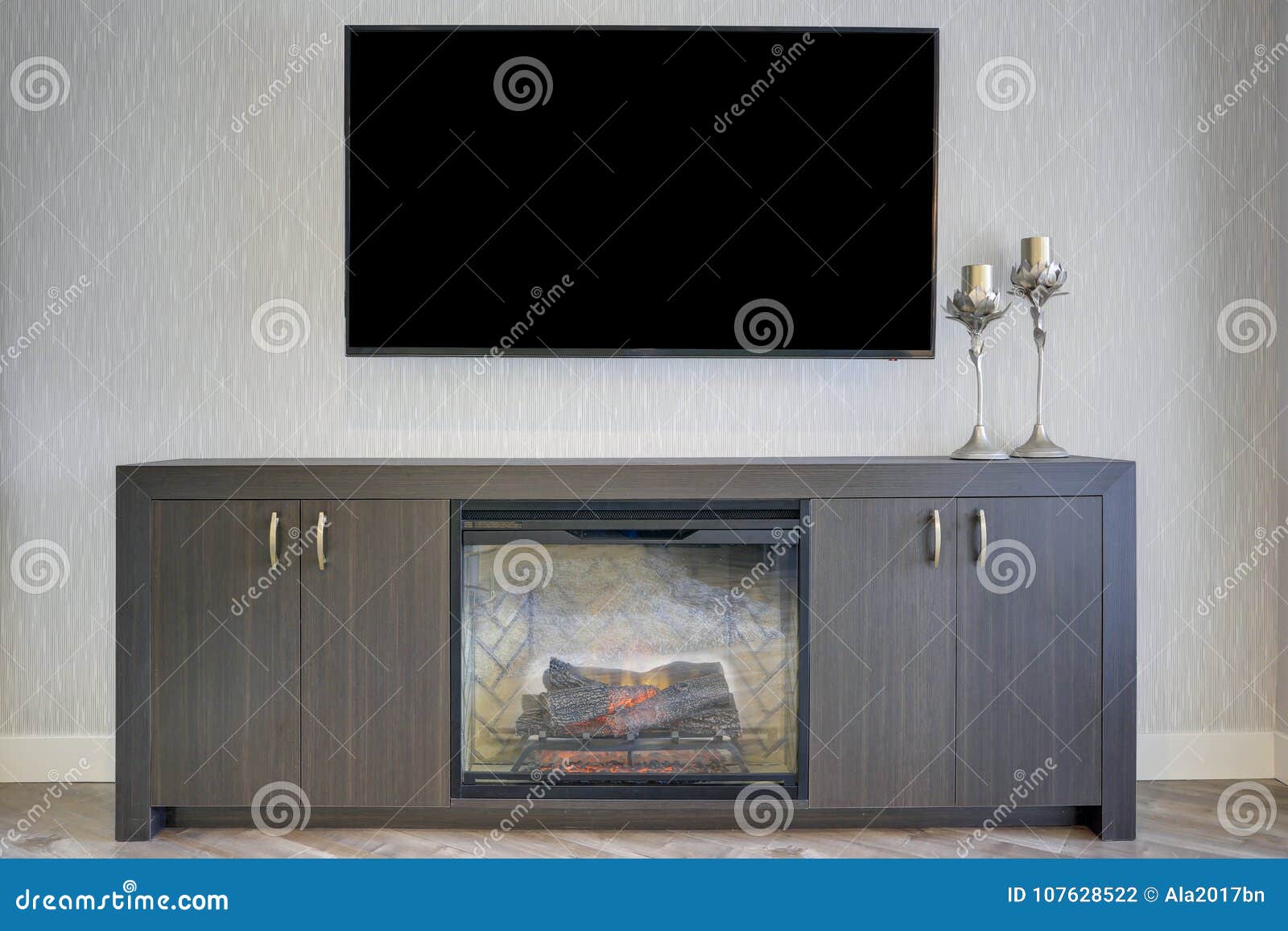 Lovely Family Room With Detail Of Tv And Fireplace Stock Photo