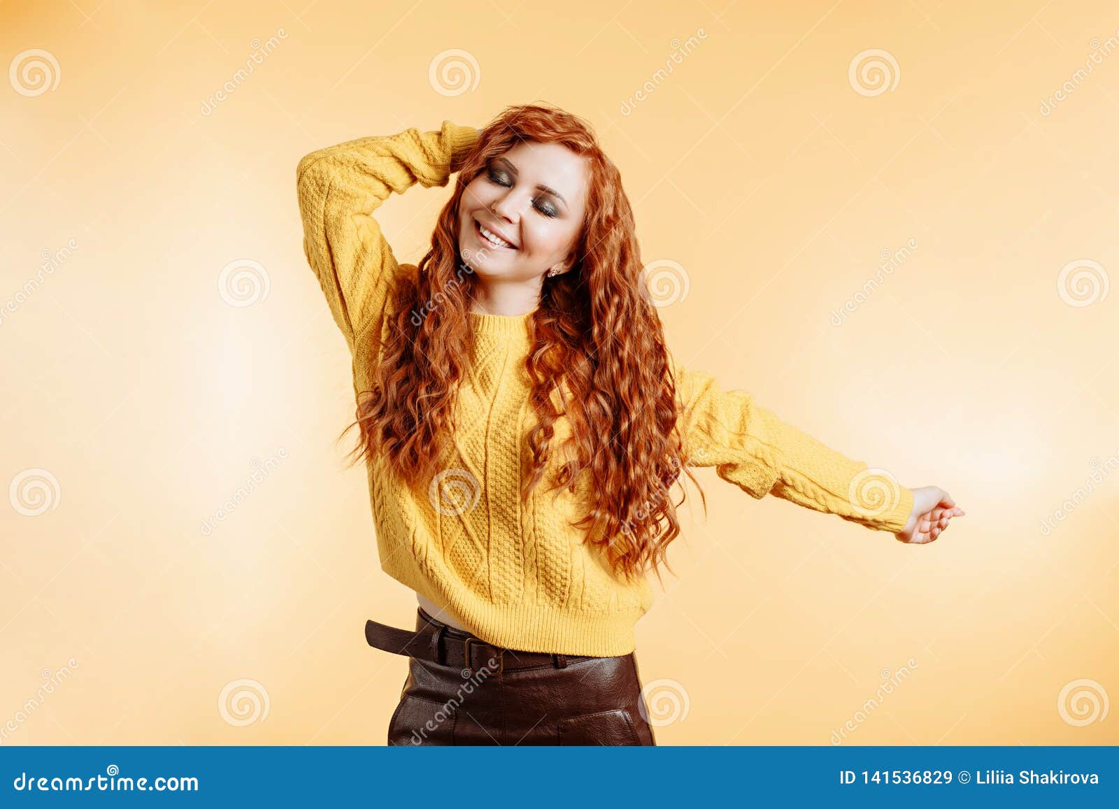 Redhead Woman Dancing With Happiness Face Expression Stock Image