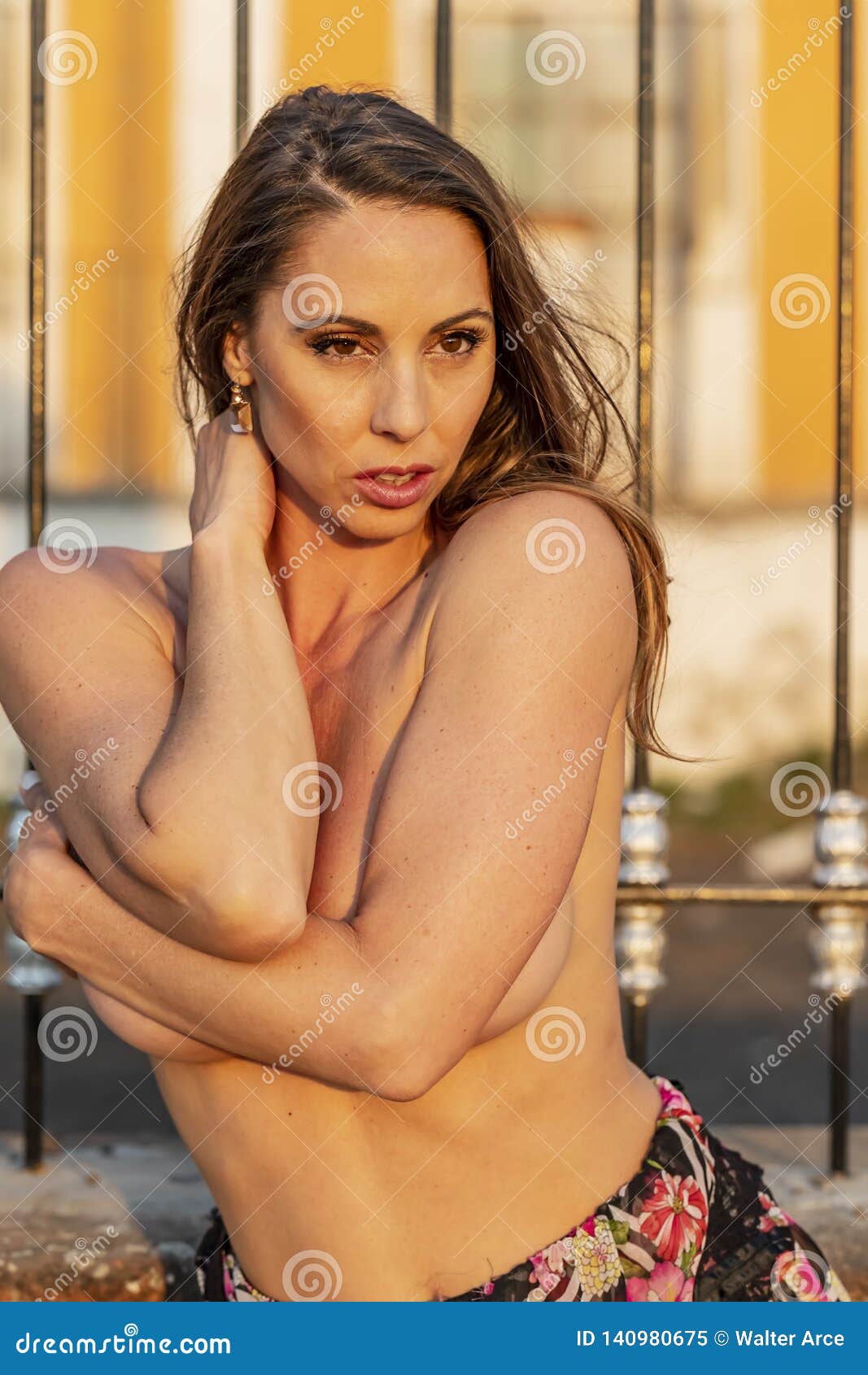 A Lovely Hispanic Brunette Model Poses Nude on a Mexican Ranch Stock Image 