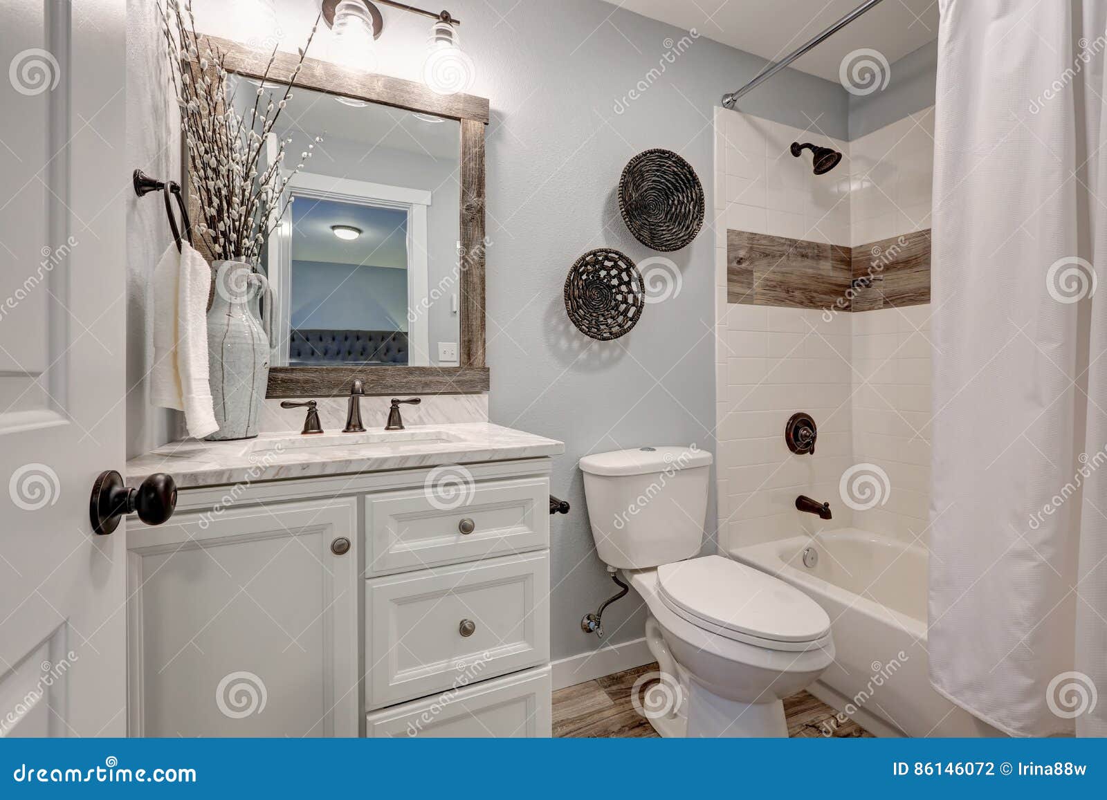 Lovely White Bathroom Design With Reclaimed Wood Touches Stock