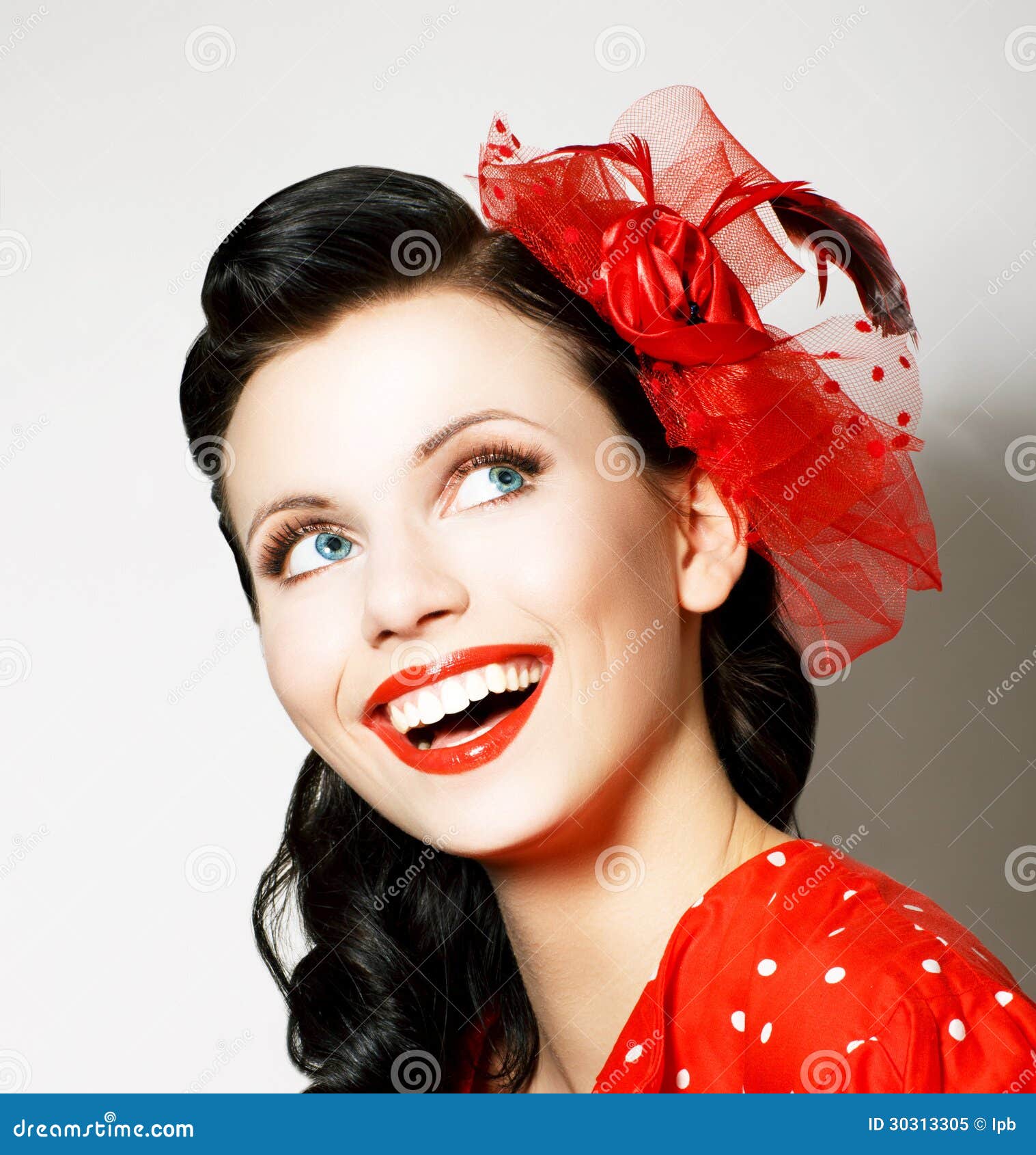 vitality. cheerful young woman with red bow enjoying. pleasure