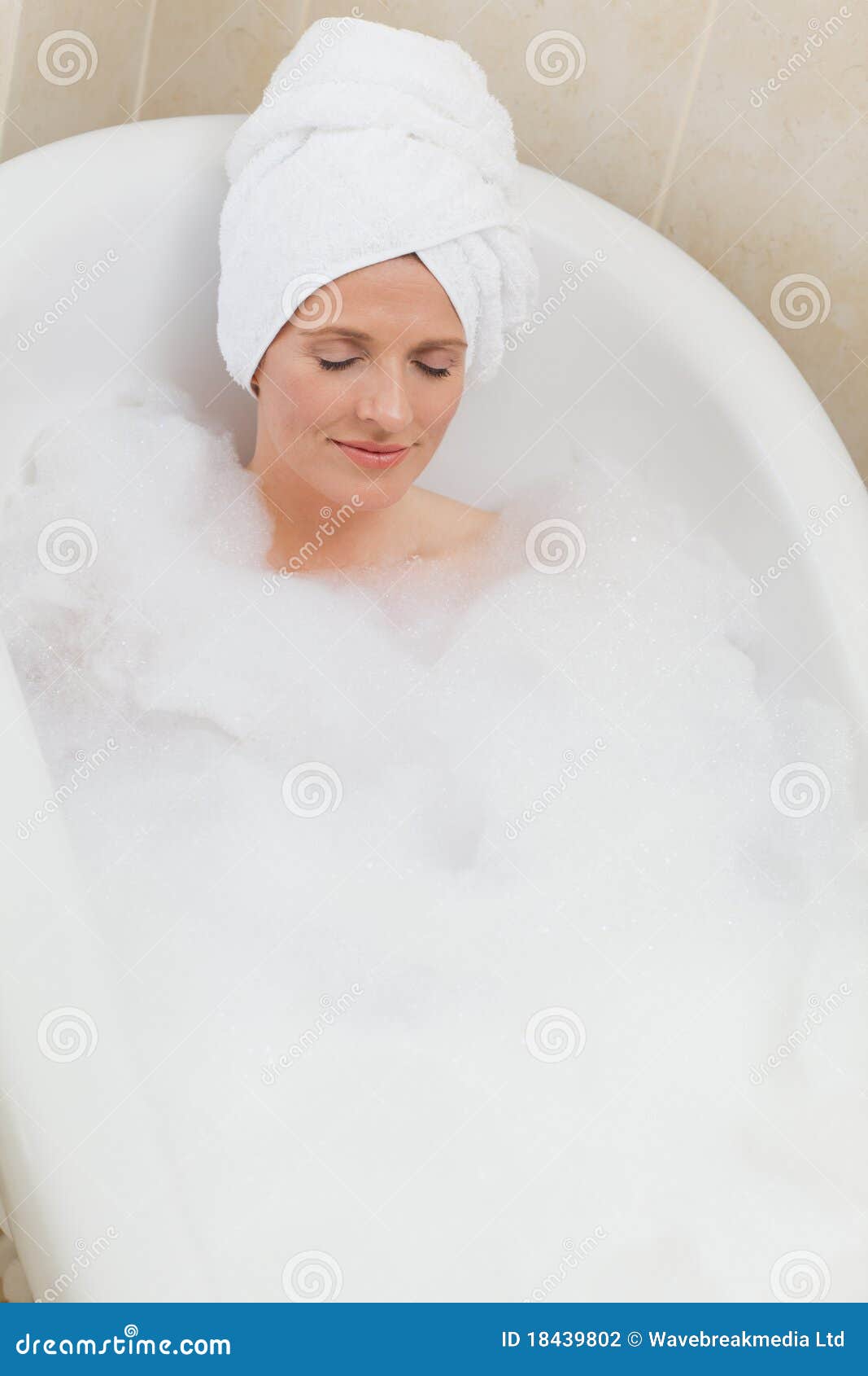 Lovely woman taking a bath stock photo. Image of relaxed 18439802