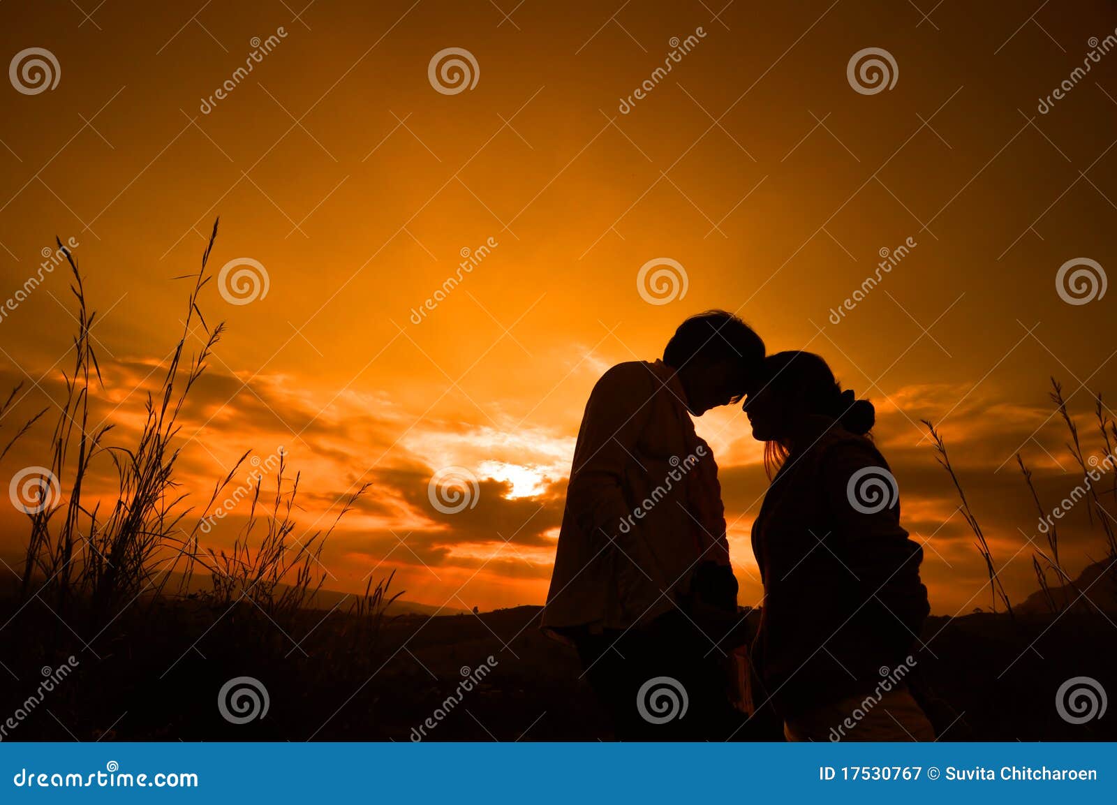 lover couple in sunset background