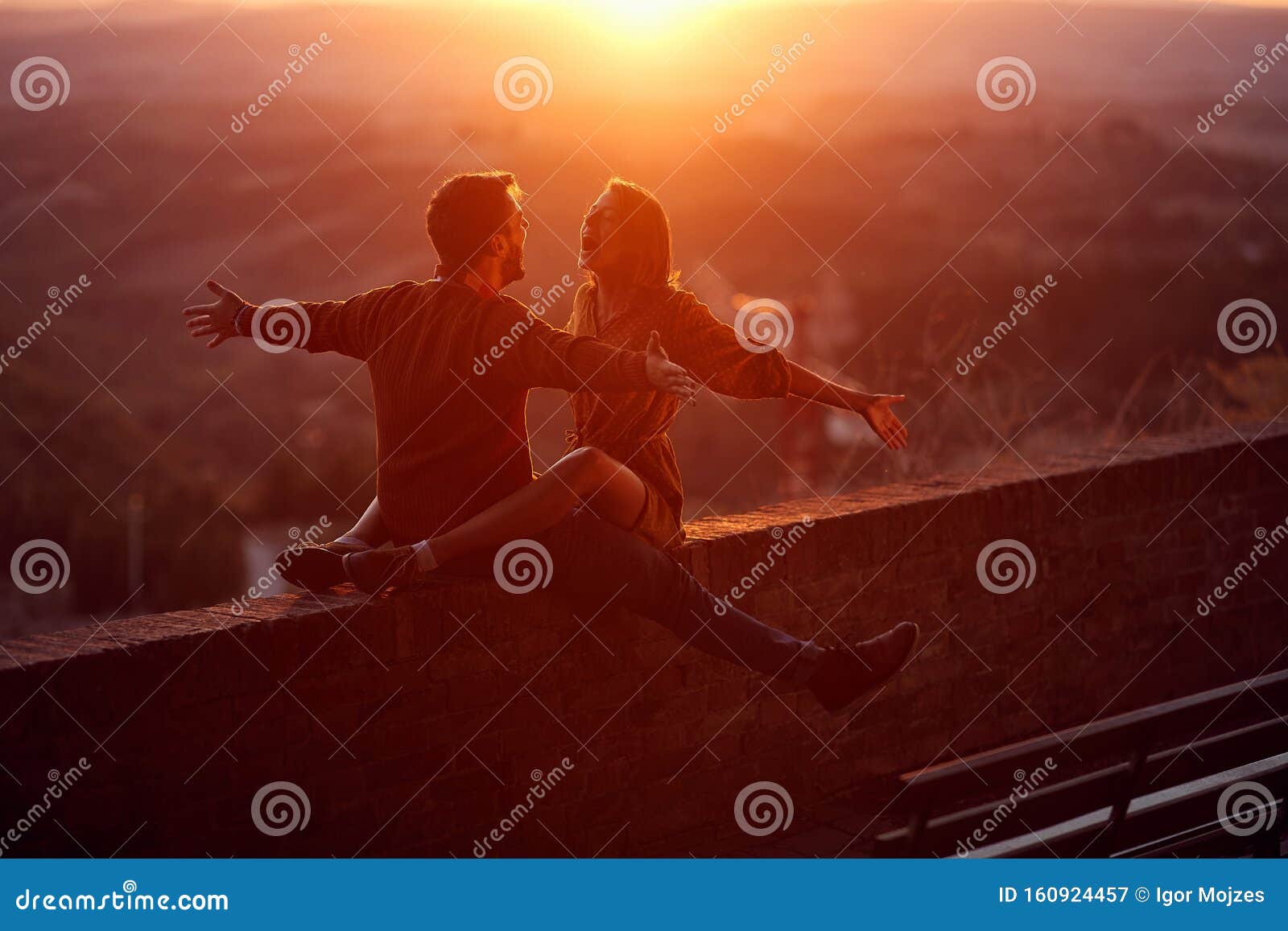 lovers. romantic at sunset. man and woman smiling and enjoying together