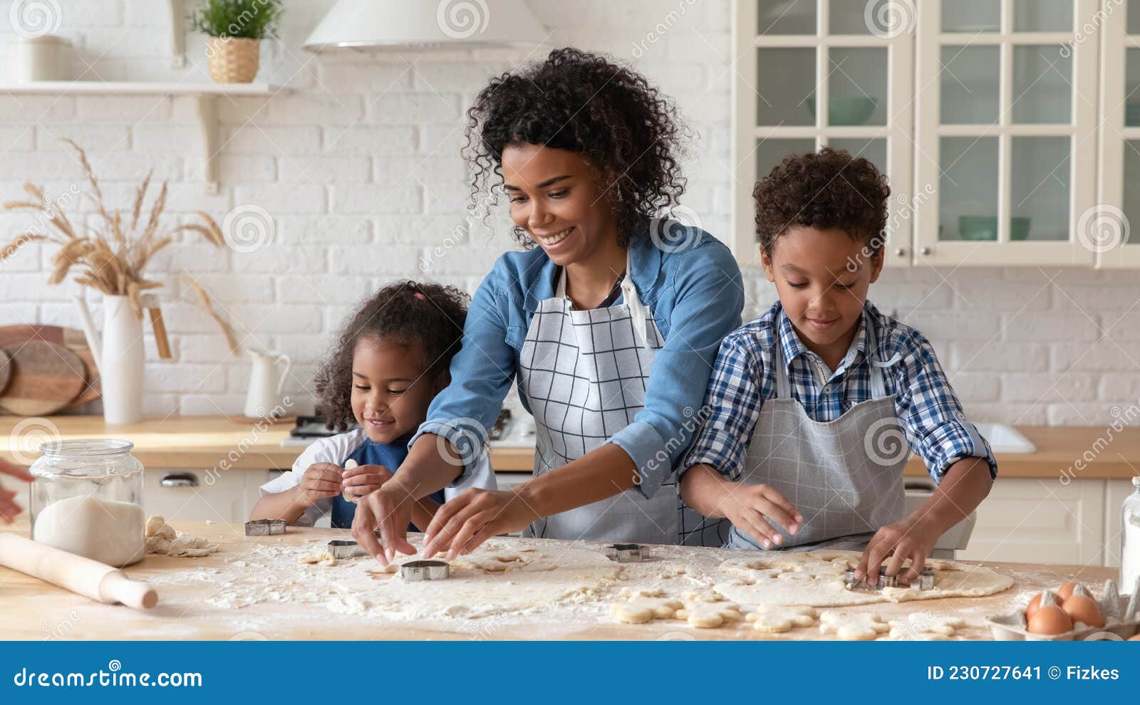 https://thumbs.dreamstime.com/z/loving-african-american-mother-kids-cooking-homemade-cookies-together-using-dough-cutters-caring-young-mom-little-son-230727641.jpg