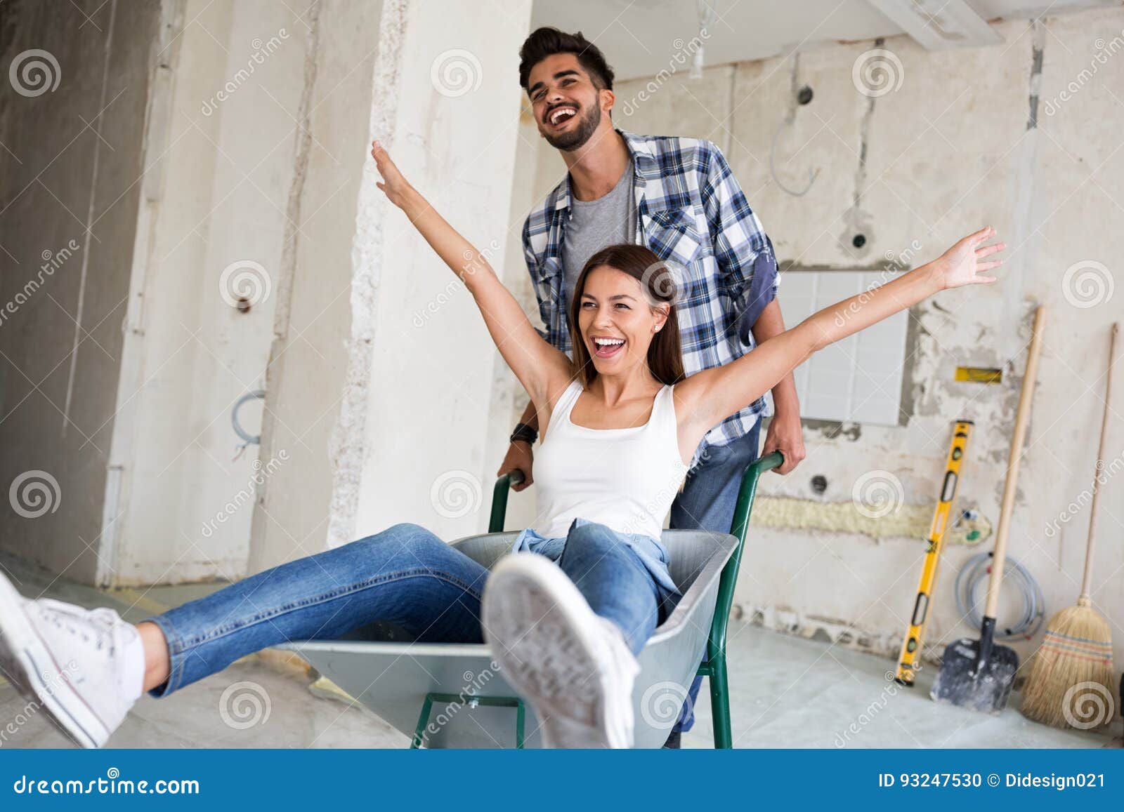 loving couple is having fun while they are renovating house