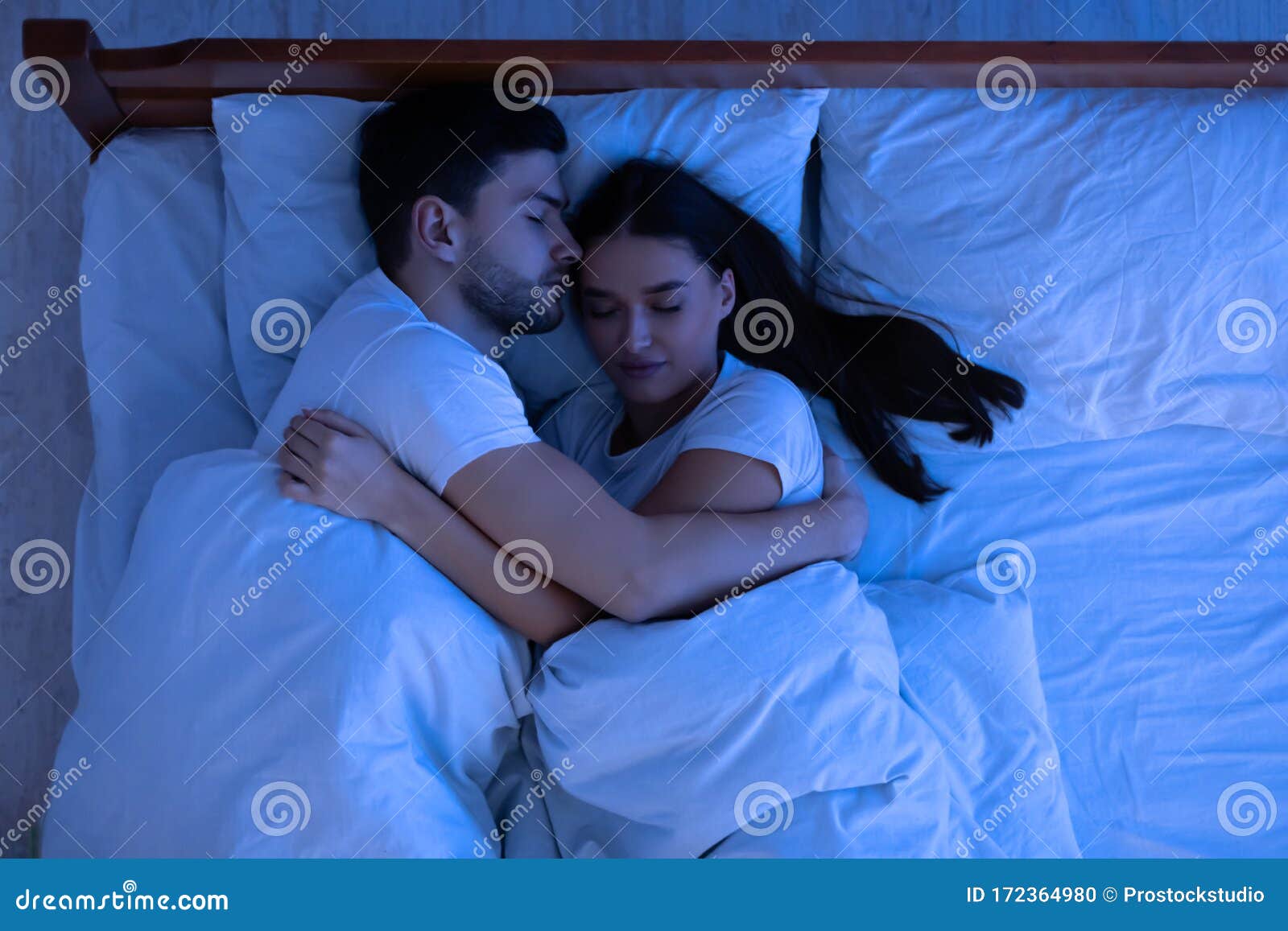 Loving Couple Hugging Sleeping in Bed at Home, Above View Stock ...