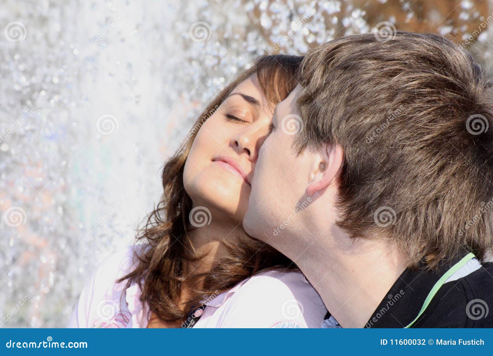 Lovingenamoured Couple Kisses Against A Fountain Stock Photo Ima
