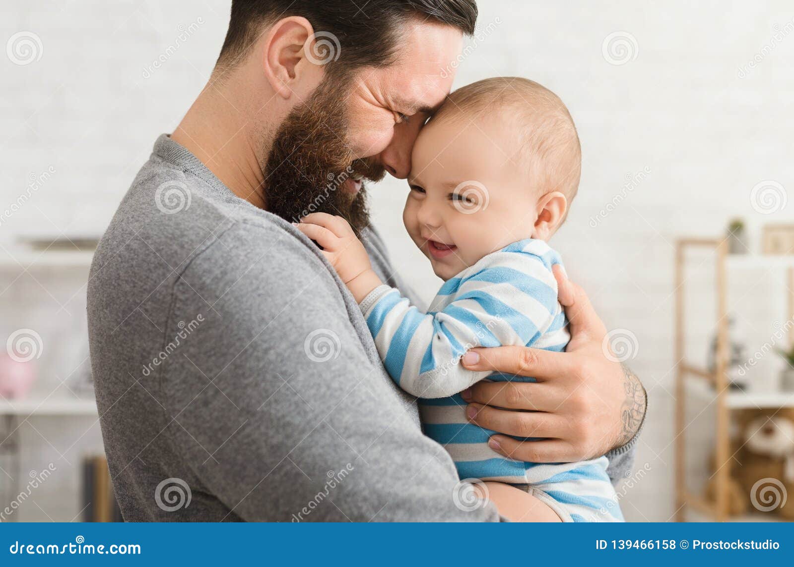 Loving Father Embracing His Cute Baby Son Stock Photo - Image of ...