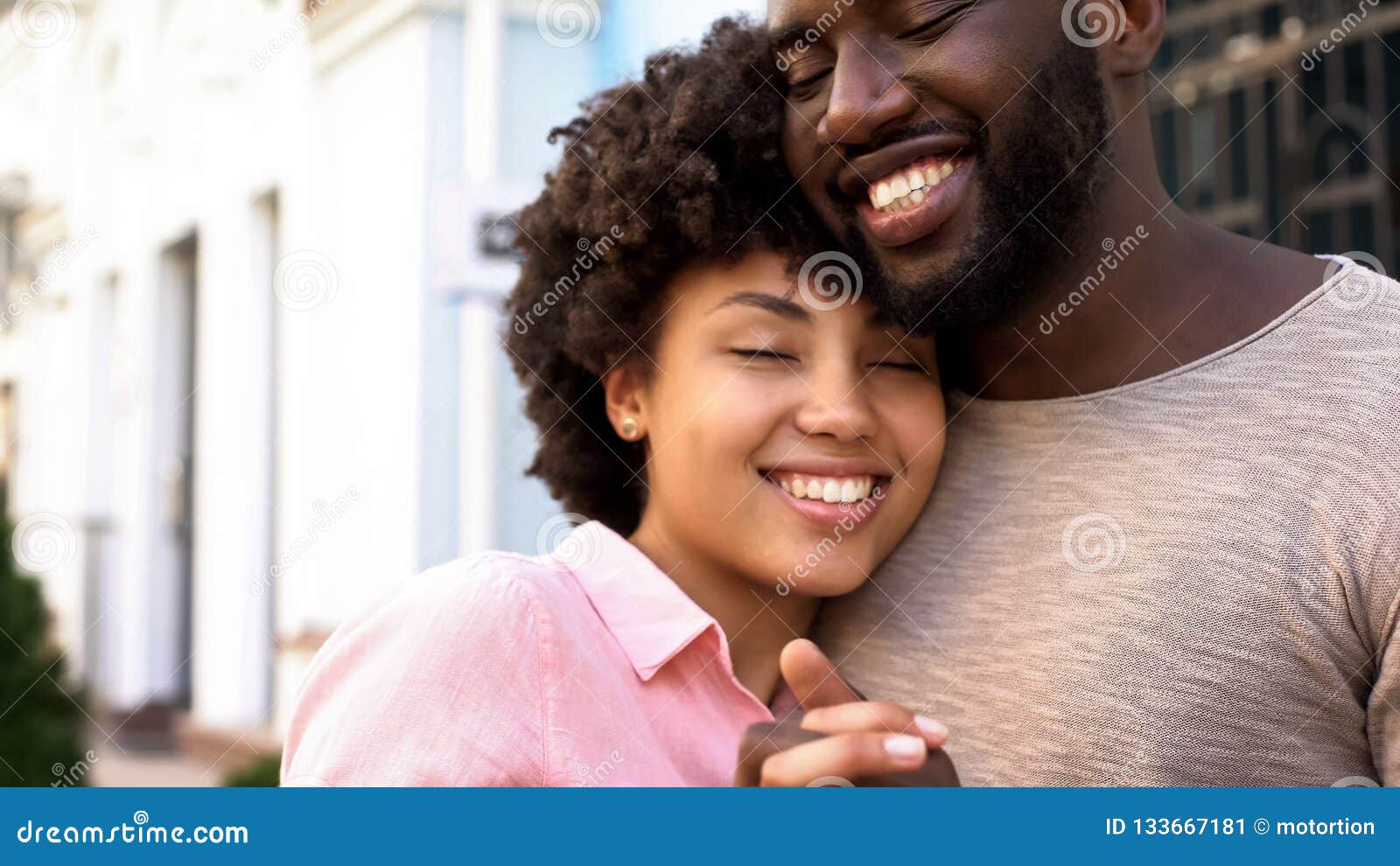 loving girlfriend hugging boyfriend outdoors, tender relations, love closeness