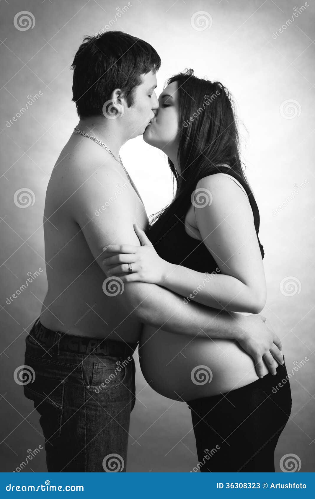 1,028 Pregnant Woman Kissing Husband Stock Photos picture pic