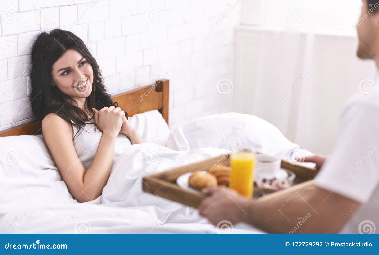 Loving Husband Bringing Breakfast in Bed for His Wife Stock Photo ...