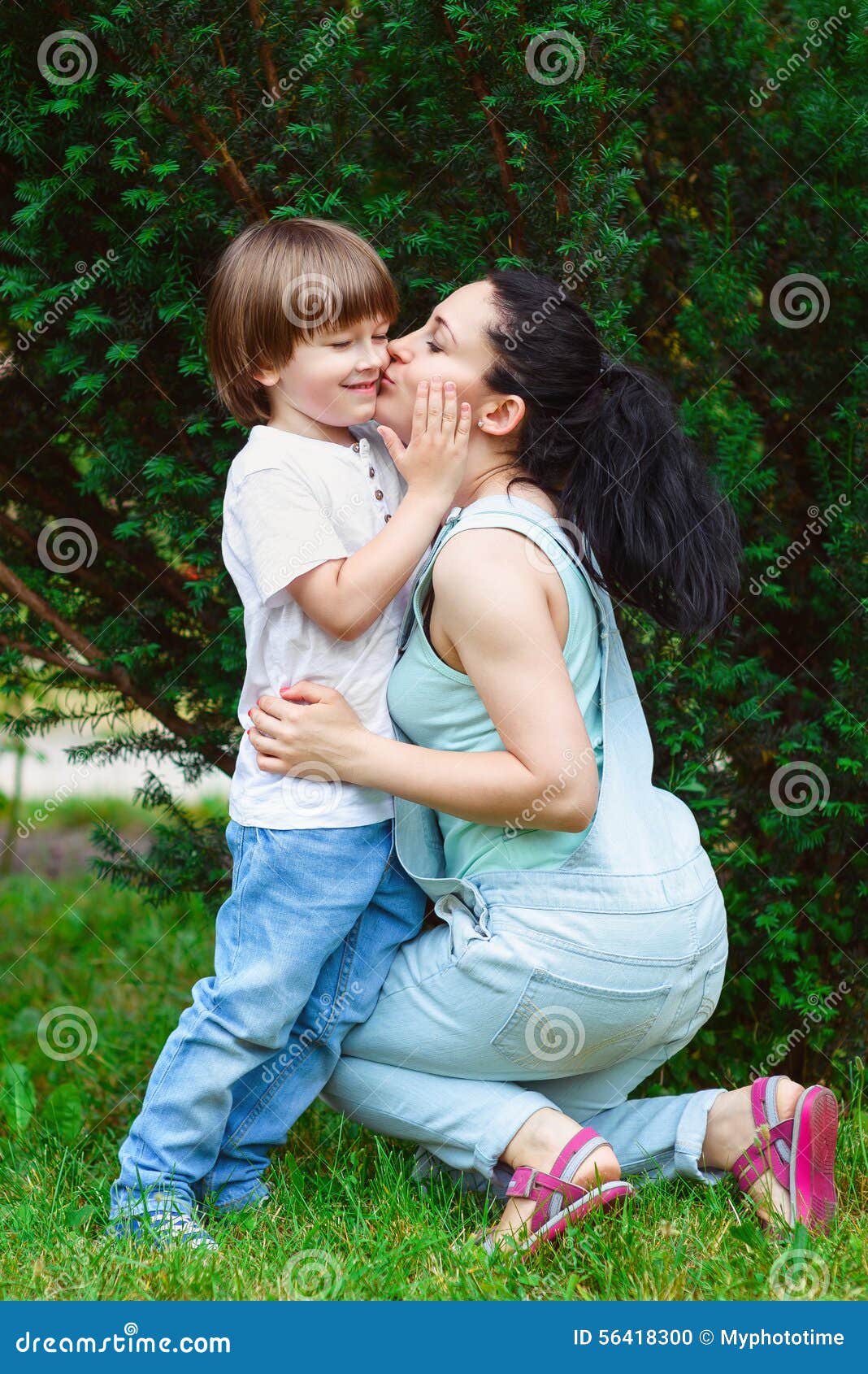 Loving Mother Kissing Her So