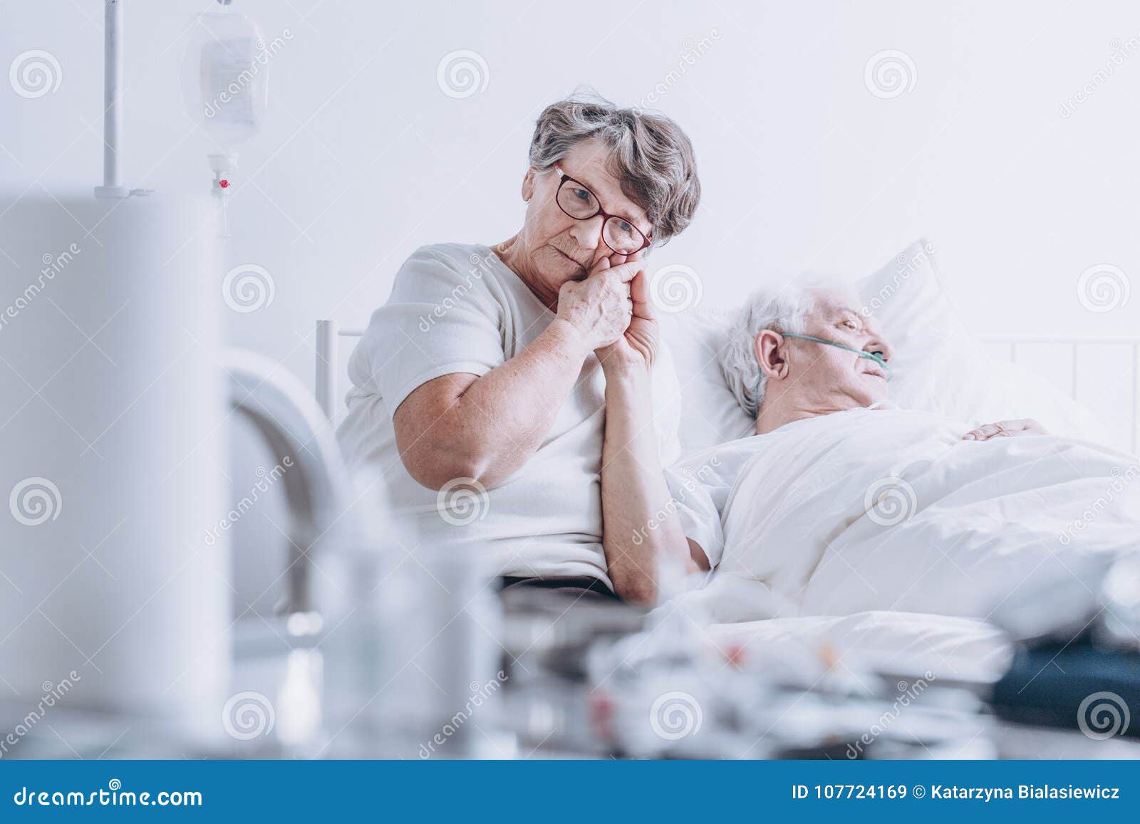 Loving Wife at Hospital Bed Stock Image