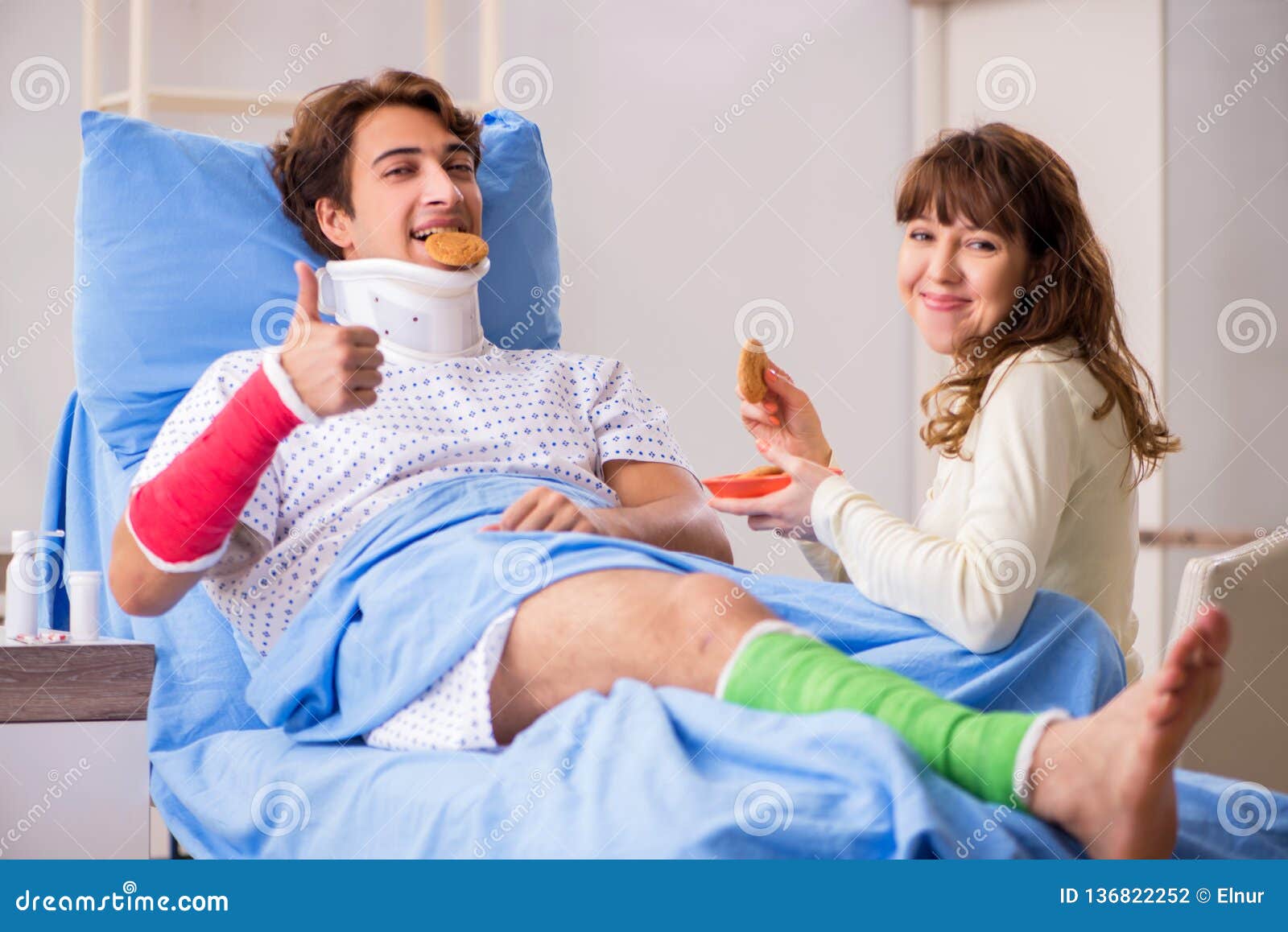 The Loving Wife Looking after Injured Husband in Hospital Stock Photo ... image