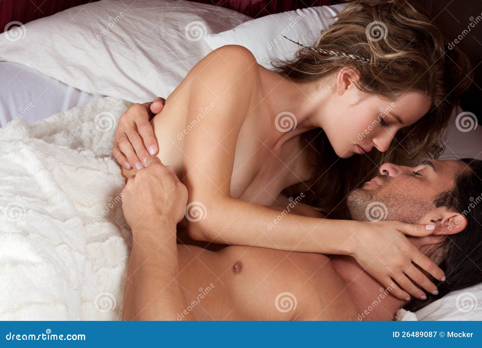 Loving Young Nude Erotic Sensual Couple in Bed Stock Image