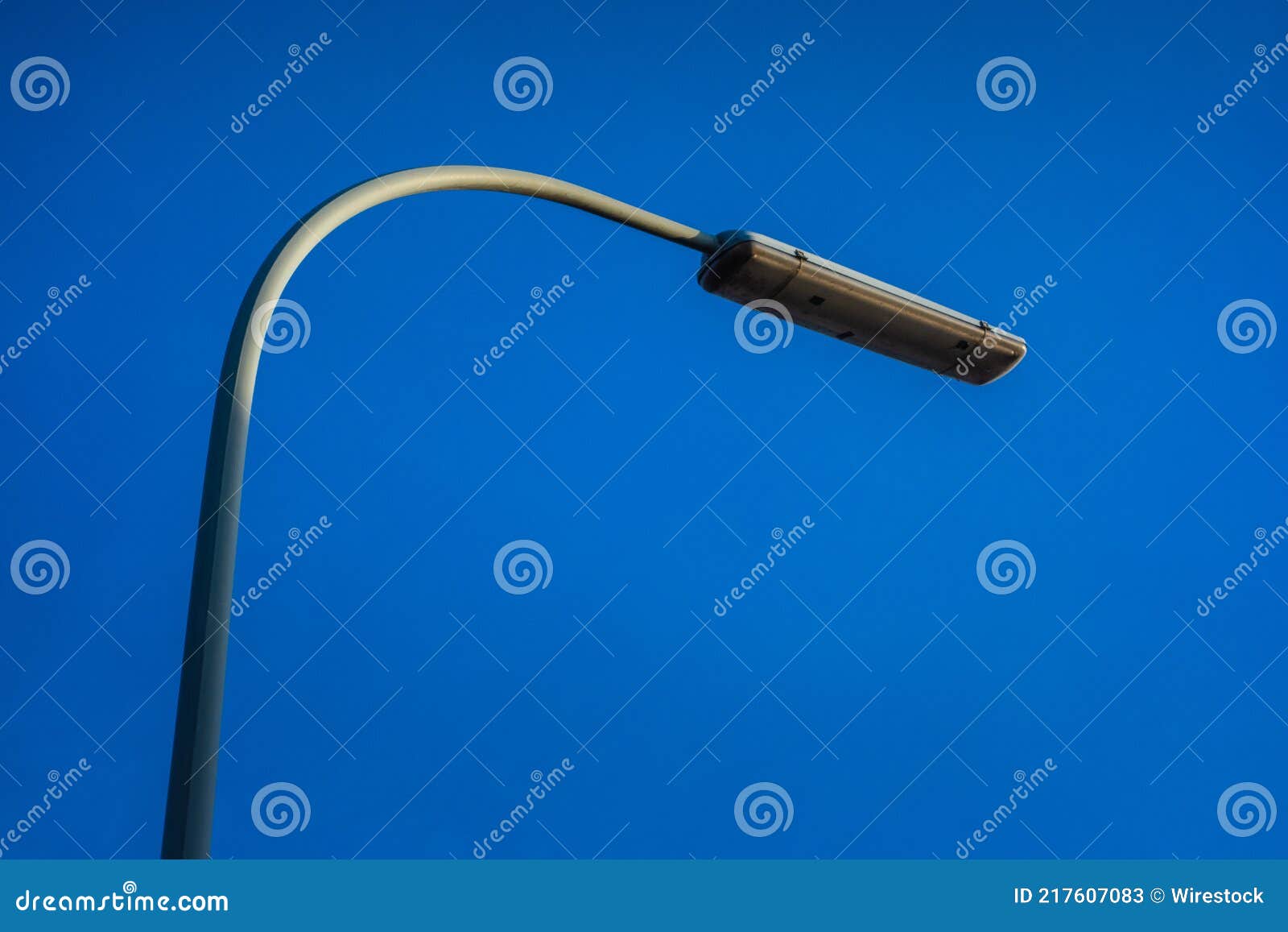 Low Angle Shot of a Streetlight on a Blue Background Stock Image