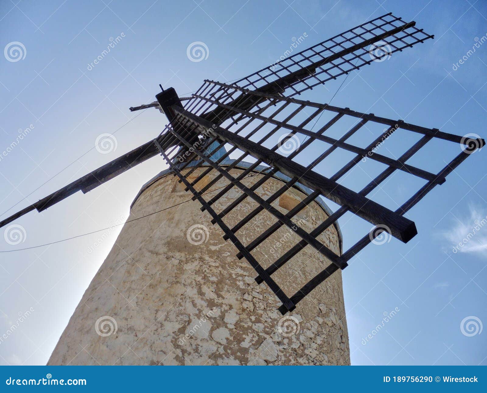 low angle shot of the windmill in molinos de viento de consuegra, spain