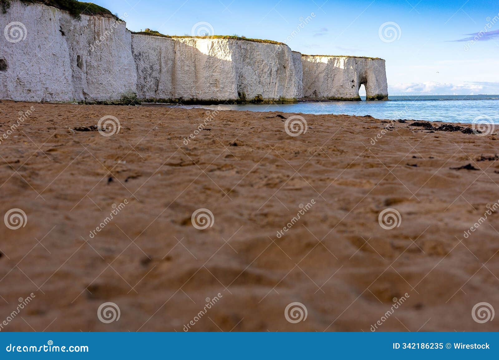 sandy beach and white cliffs at botany bay.