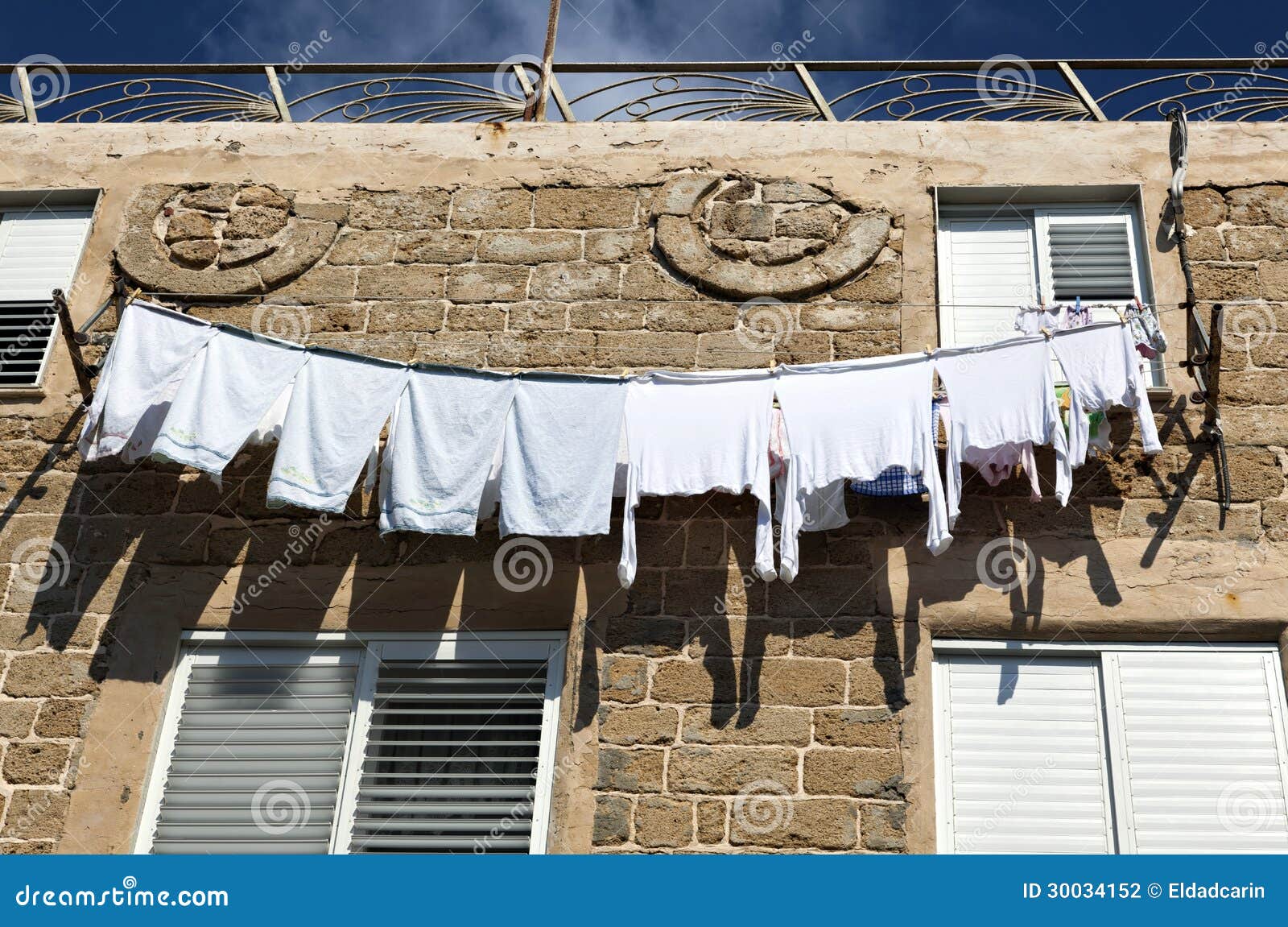 white laundry drying on the clothline