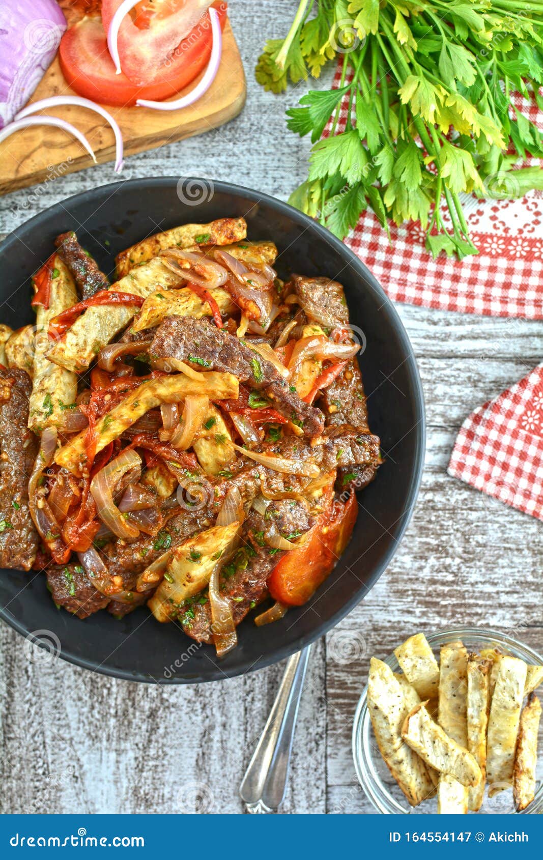 low-carb keto fried beef steak strips with baked celery fries - peruvian lomo saltado con papa fritas de nabo