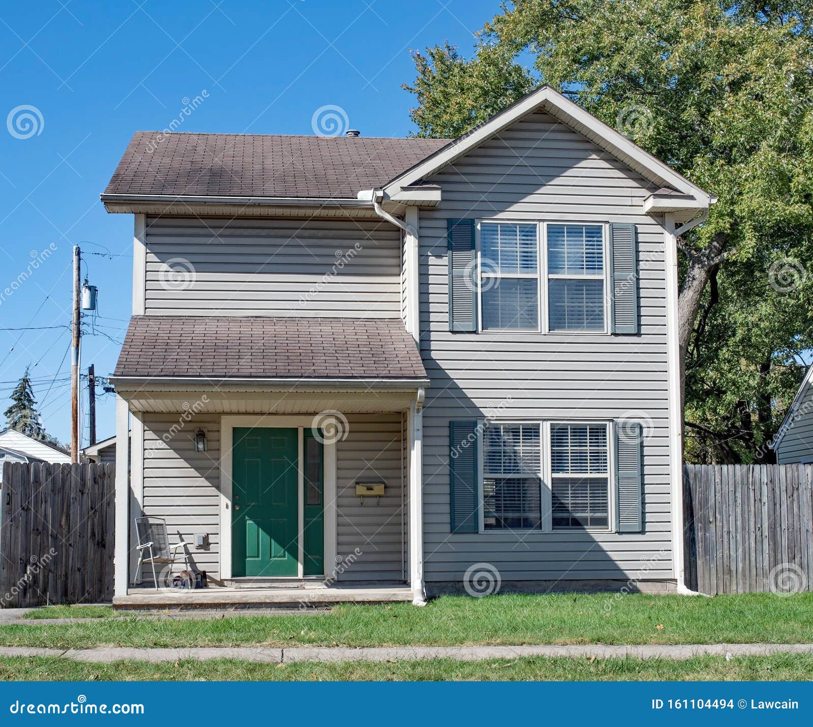 low income house with green door