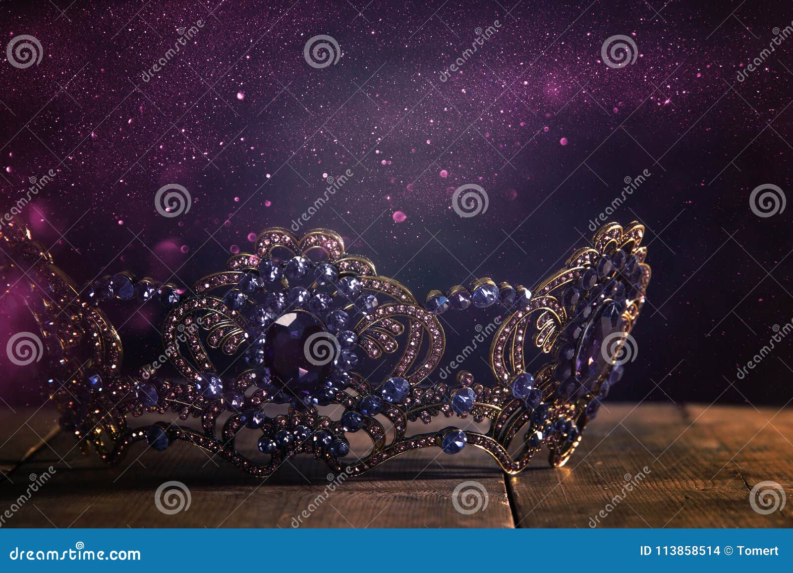 low key image of beautiful queen/king crown. fantasy medieval period. selective focus.