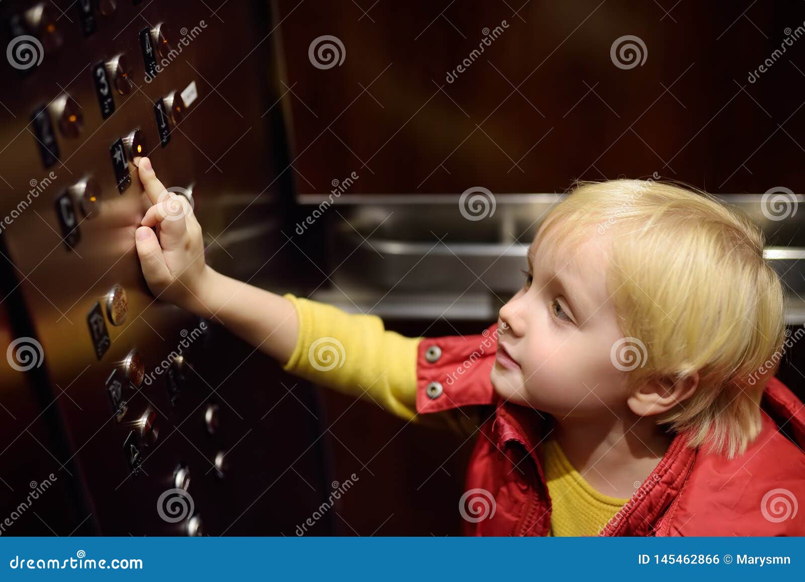 Lttle Boy Pressing Button of Lobby in Elevator Stock Photo Image of