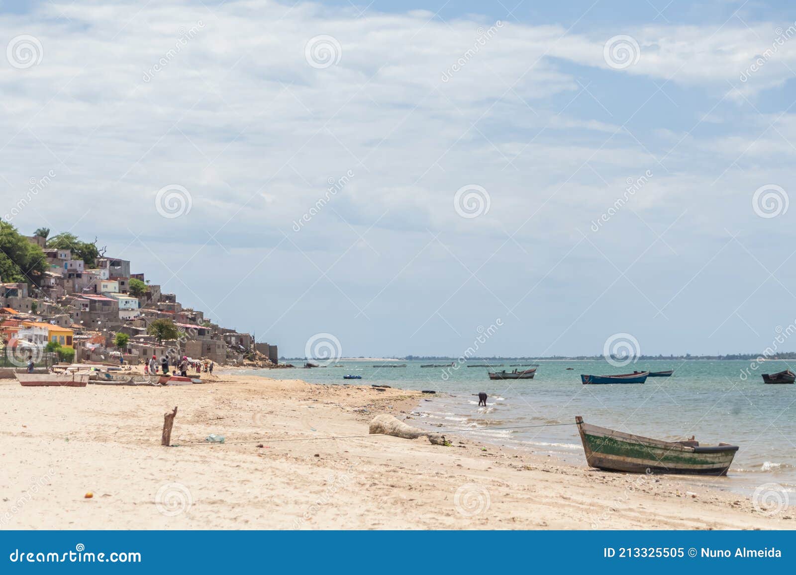 Beach View with Fishermen and Traditional Angolan Boats, in Luanda