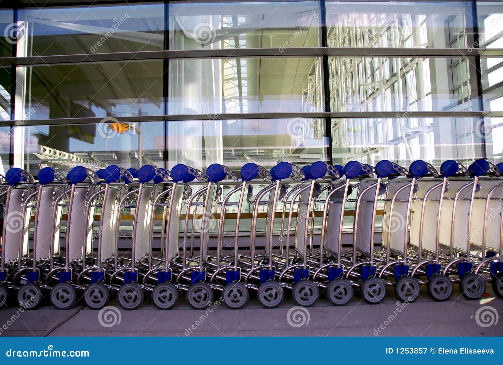Luggage carts airport stock image. Image of departure 1253857