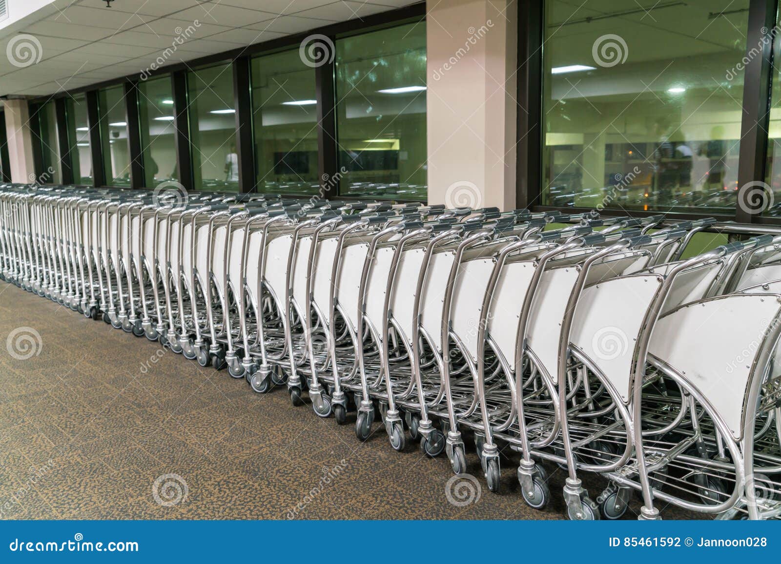 Luggage Carts at Airport Terminal . Stock Photo Image of depart