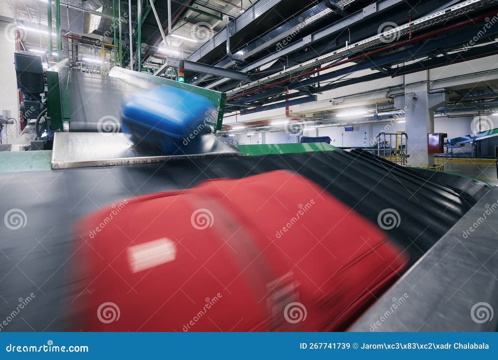 Luggage on conveyor belt stock image. Image of journey 267741739