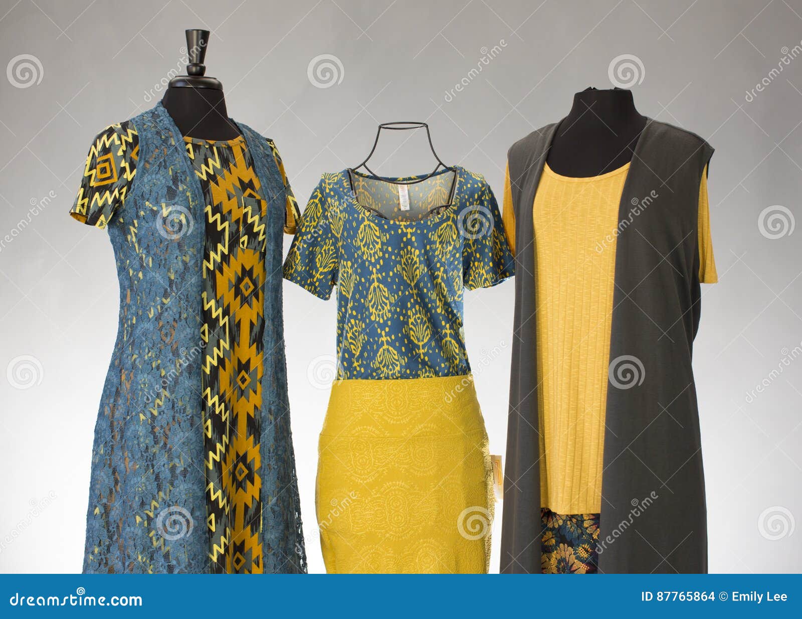 https://thumbs.dreamstime.com/z/lularoe-clothing-collection-gold-teal-themed-brand-displayed-three-mannequins-layered-outfits-made-87765864.jpg