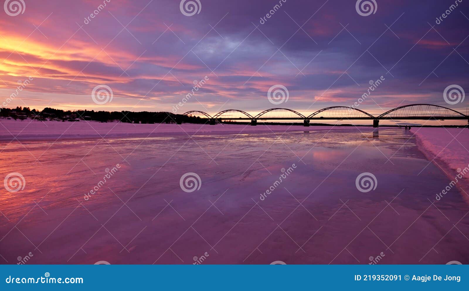 lulea bridge at sunset from the iceroad on a winter day in sweden