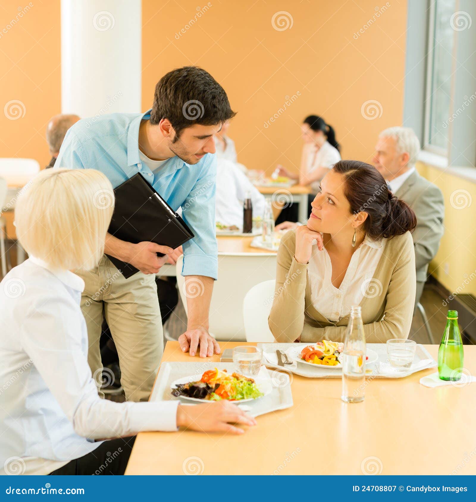 lunch break office colleagues eat salad cafeteria