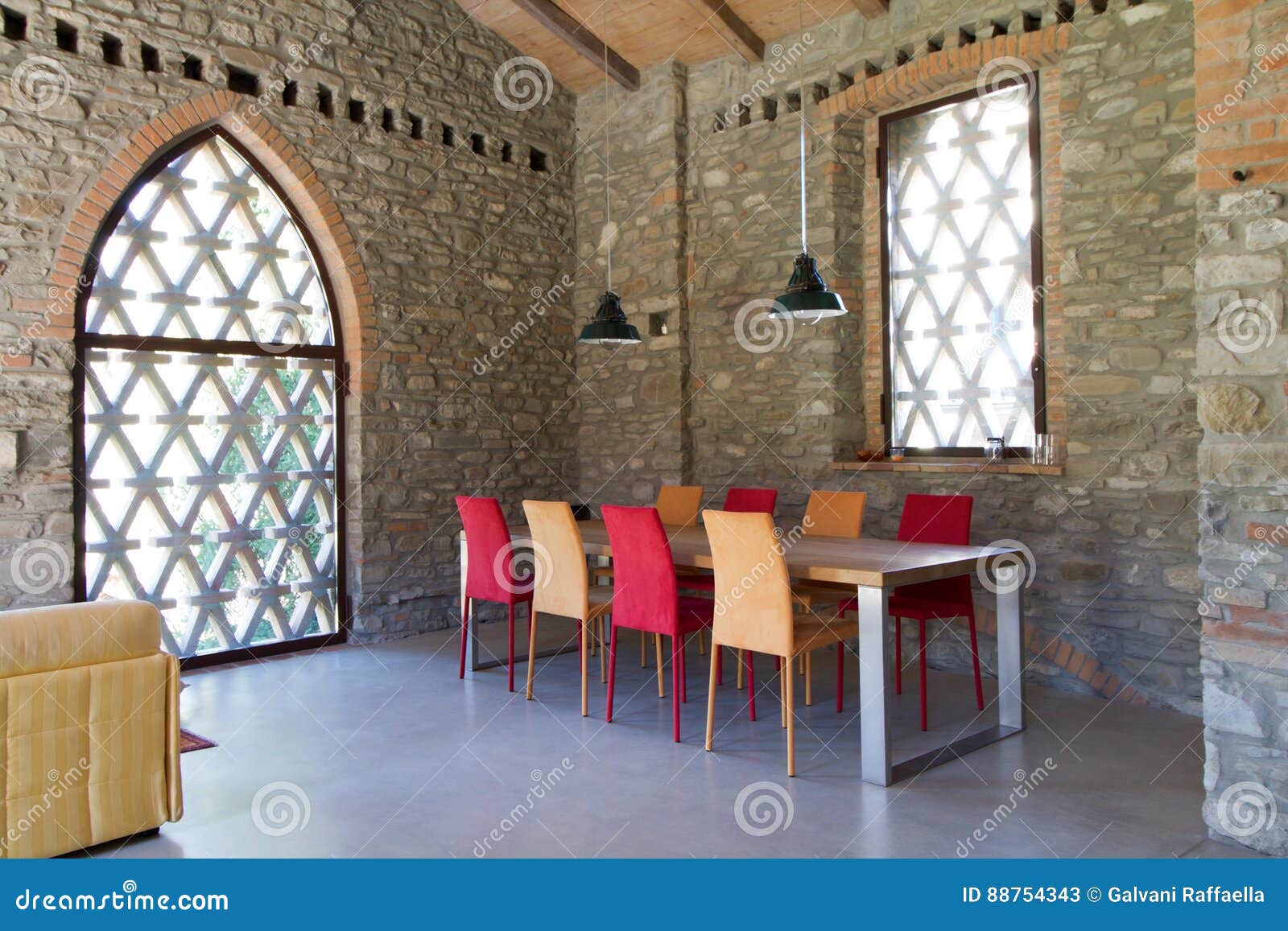 lunchroom in a loft with two-tone chairs