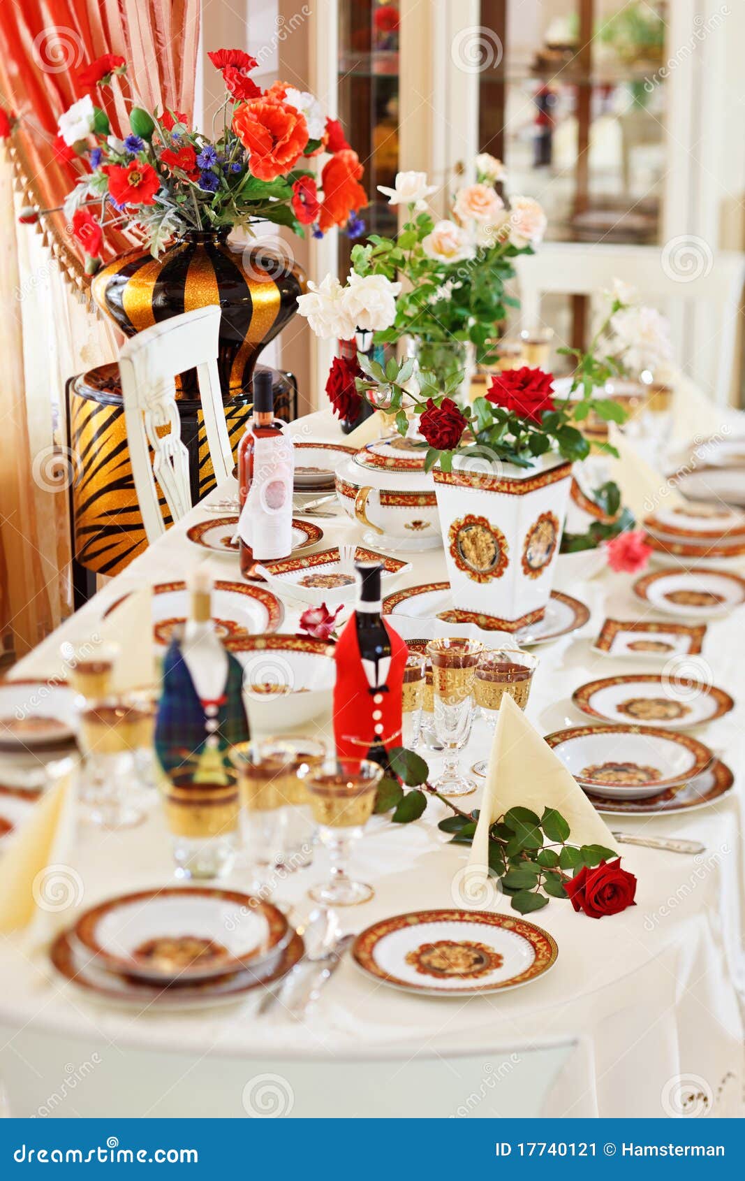 luxuriant table appointments with red porcelain