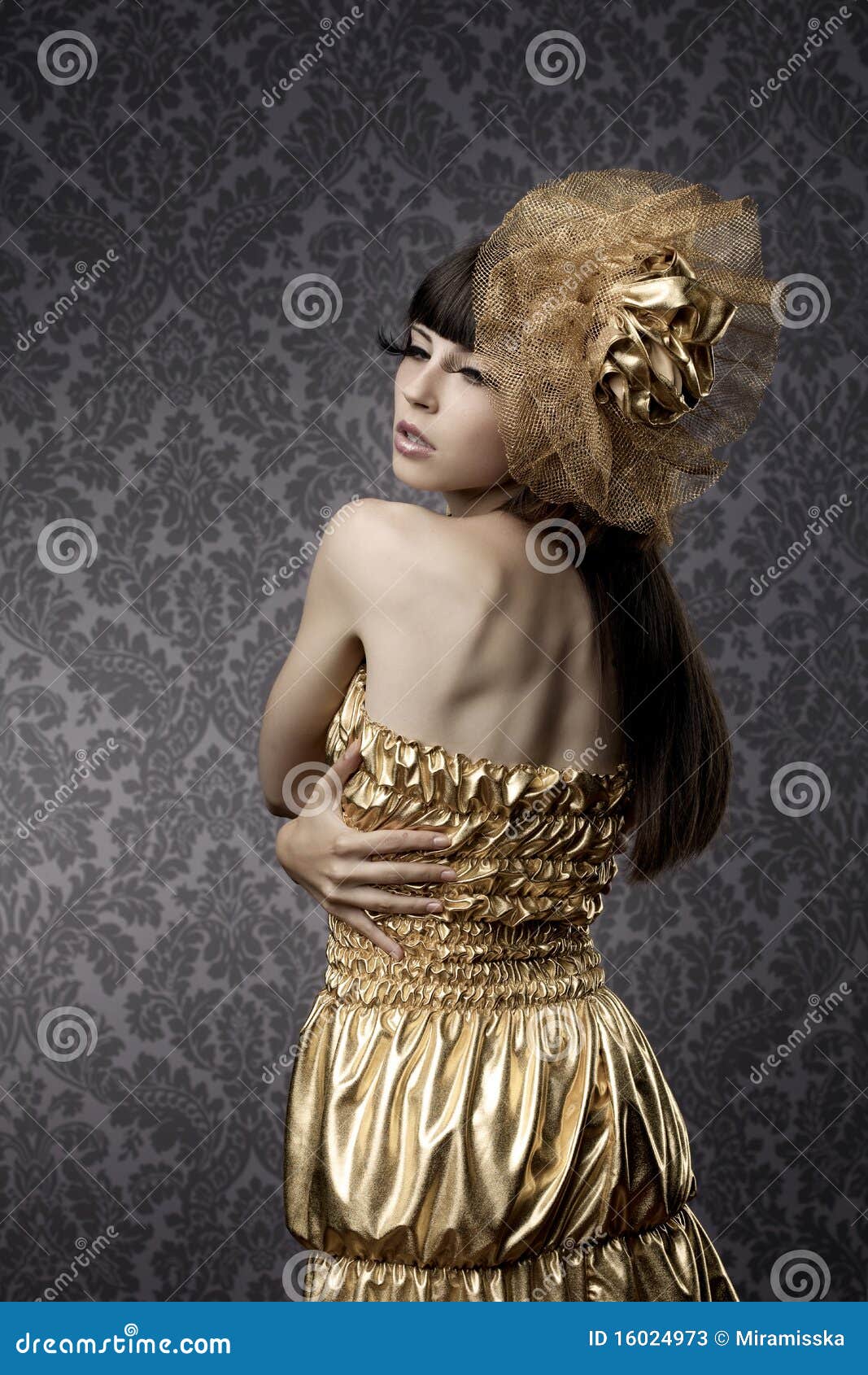 luxurious glamorous models in gold