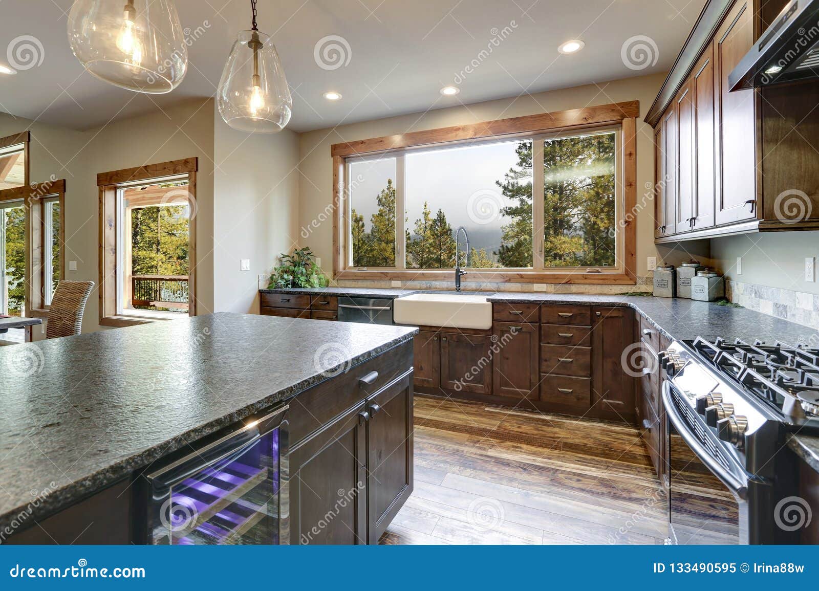 Luxurious Open Plan Kitchen Design With Large Center Island Stock