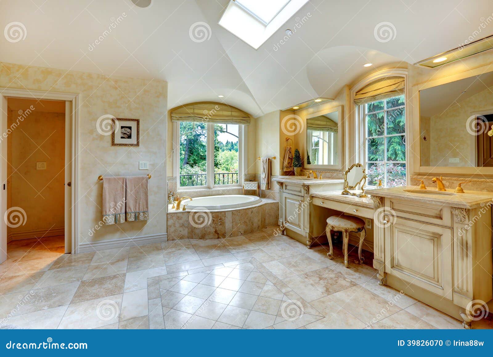 luxury bathroom with antique vanity and cabinets